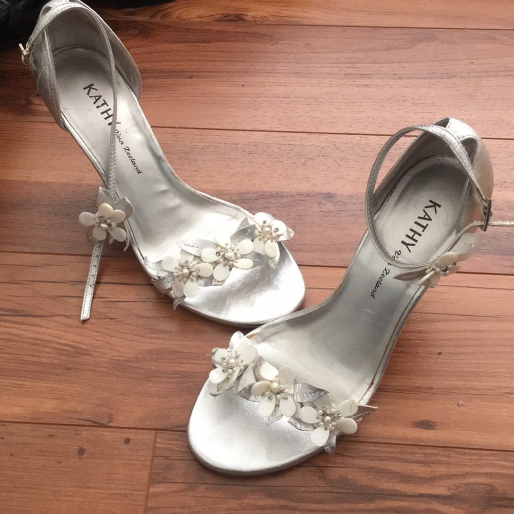 Metallic silver wedges in original box